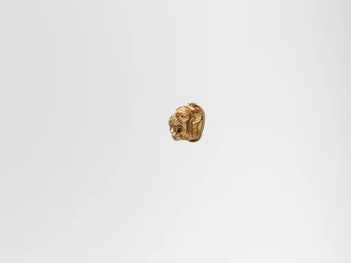 Gold pendant in the form of a lion's head