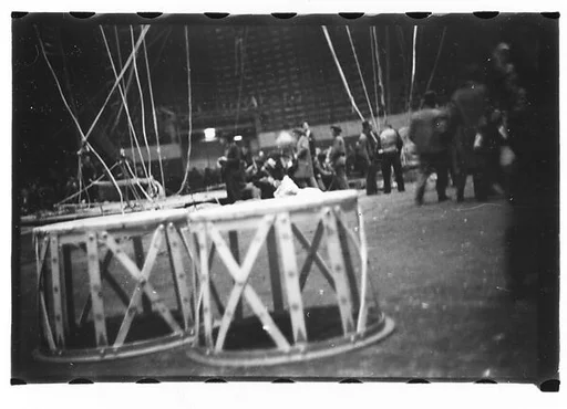 [Thirty-Seven 35mm Film Frames on Uncut Roll of a Circus at Madison Square Garden, New York City, Including Performers and Stage Crew During Rehearsal and Set-Up, and Prop Studies]