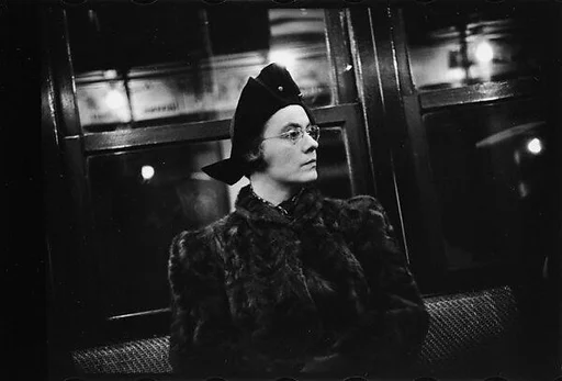 [Five 35mm Film Frames: Subway Passengers, New York City: Woman Wearing Eyeglasses and Hat, Man in Hat]