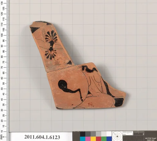 Terracotta fragment of a kylix (drinking cup)