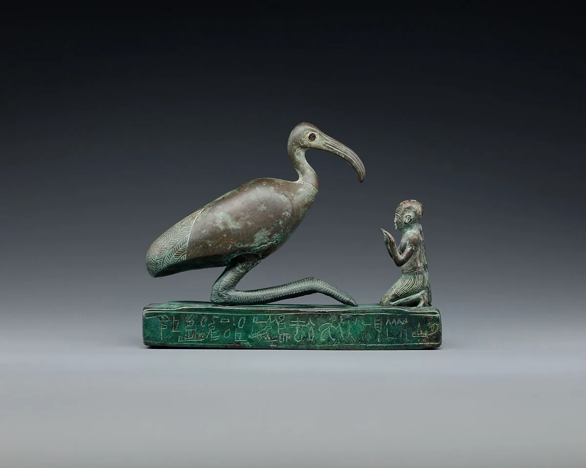 Group statue of Thoth-ibis and devotee on a base inscribed for Padihorsiese — Unknown