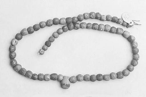 Necklace of Ball Beads and a Vase Amulet