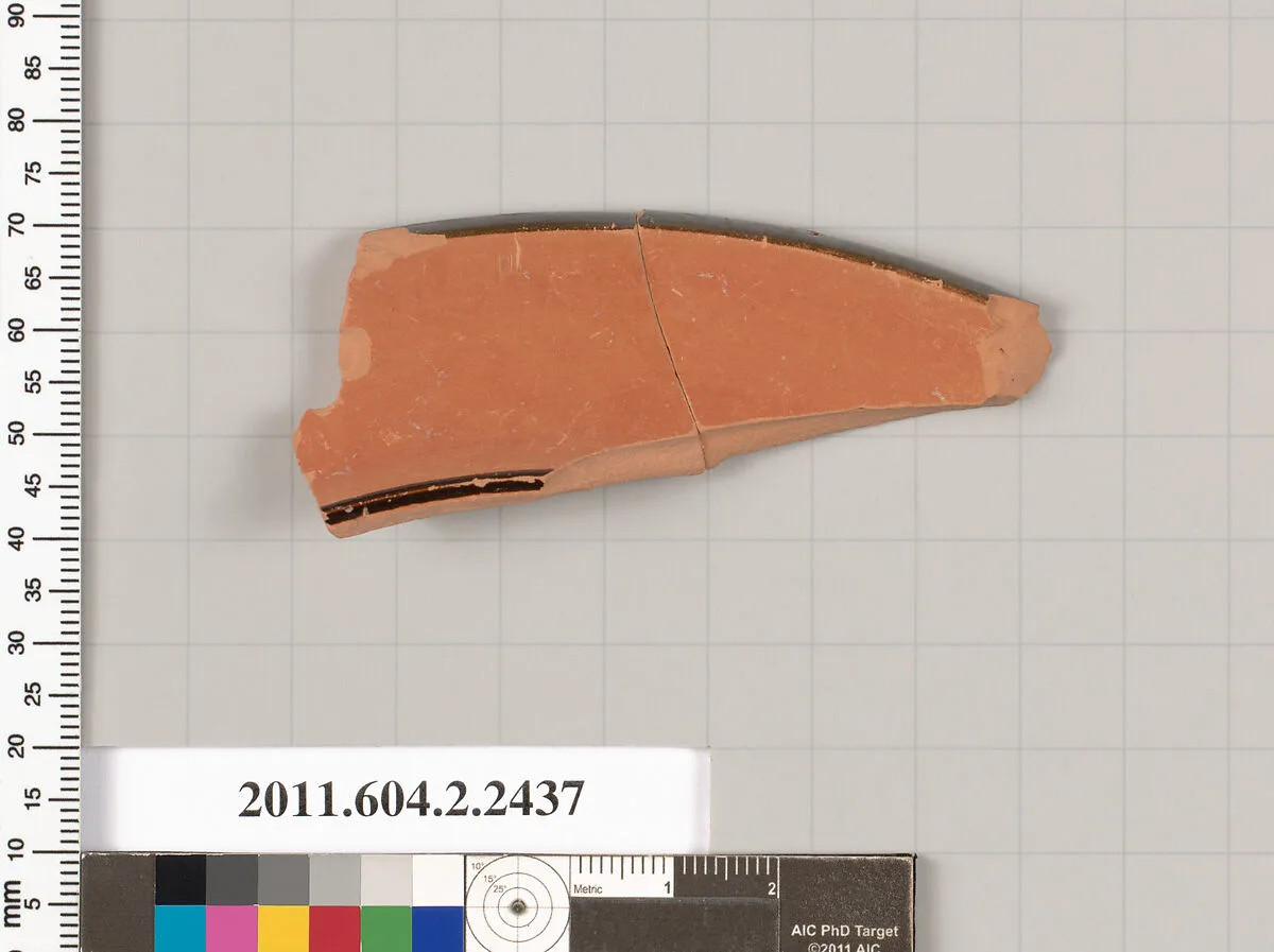 Terracotta rim fragment from a plate — Unknown