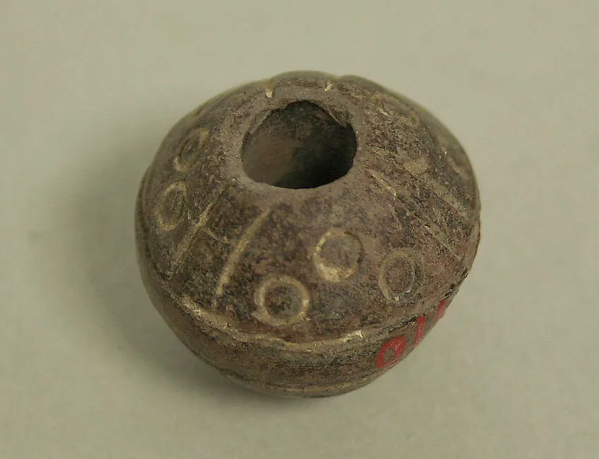 Spindle Whorl — Unknown