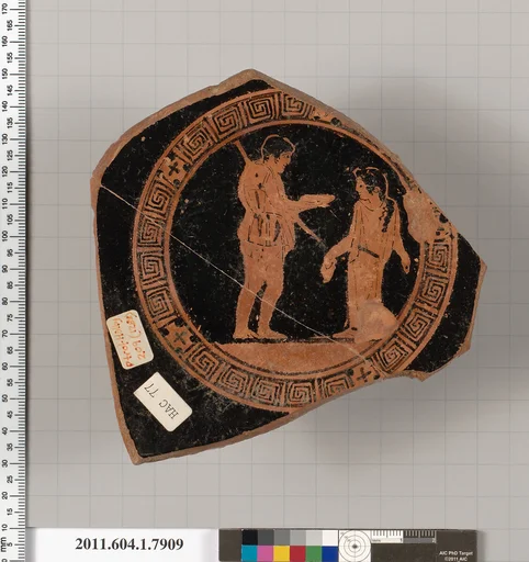 Terracotta fragment of a kylix (drinking cup)