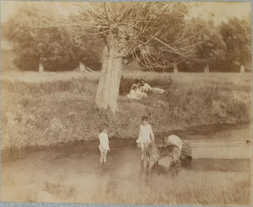[Three Children and a Dog Playing in the Creek, July 4, 1883]