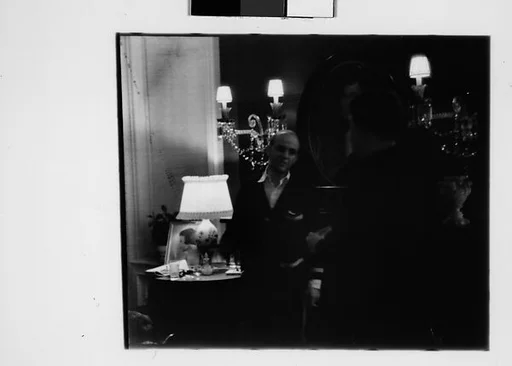 [Five 35mm Film Frames: Gifford Cochran and Unidentified Man in Library, Croton Falls, New York]