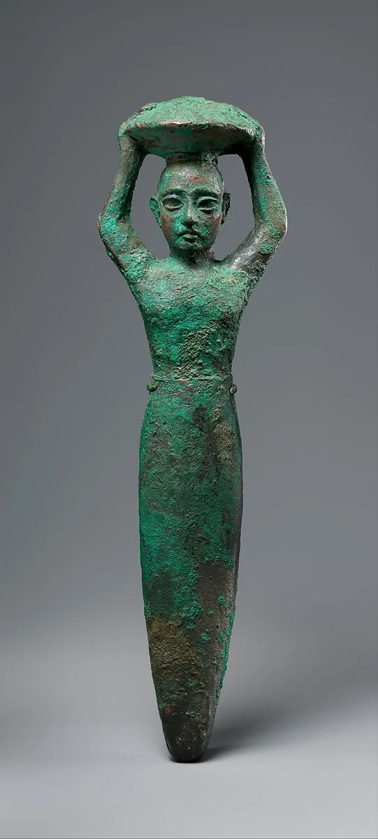 Foundation figure of king Shulgi of Ur, carrying a basket — Unknown