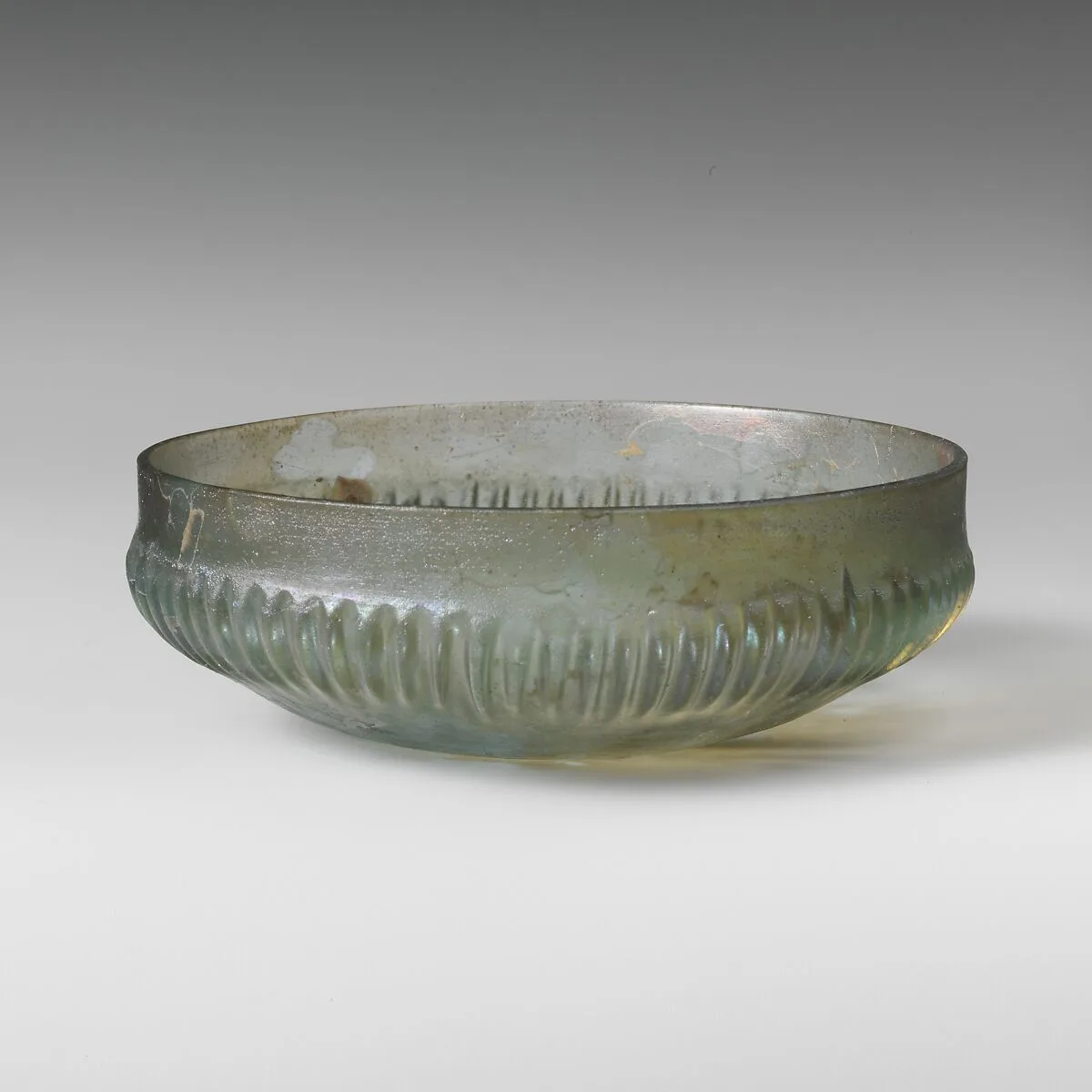 Glass ribbed bowl — Unknown