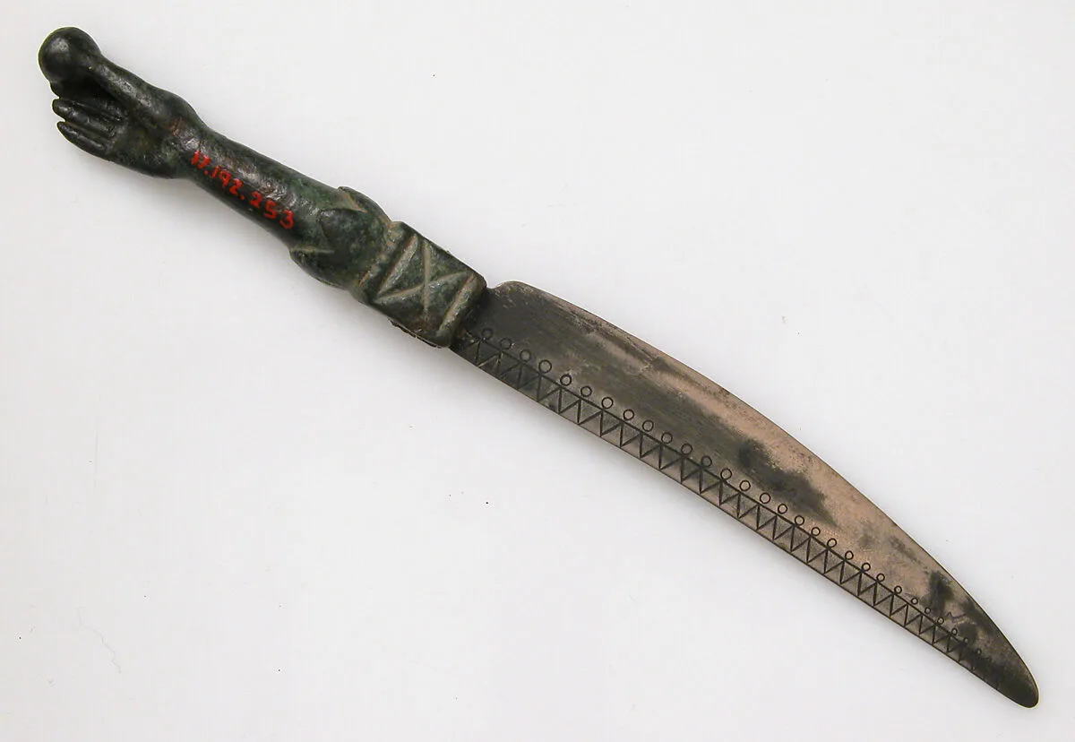 Knife with a Hand Holding an Orb — Unknown