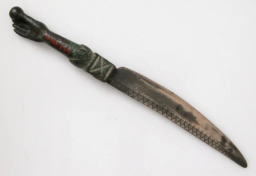 Knife with a Hand Holding an Orb