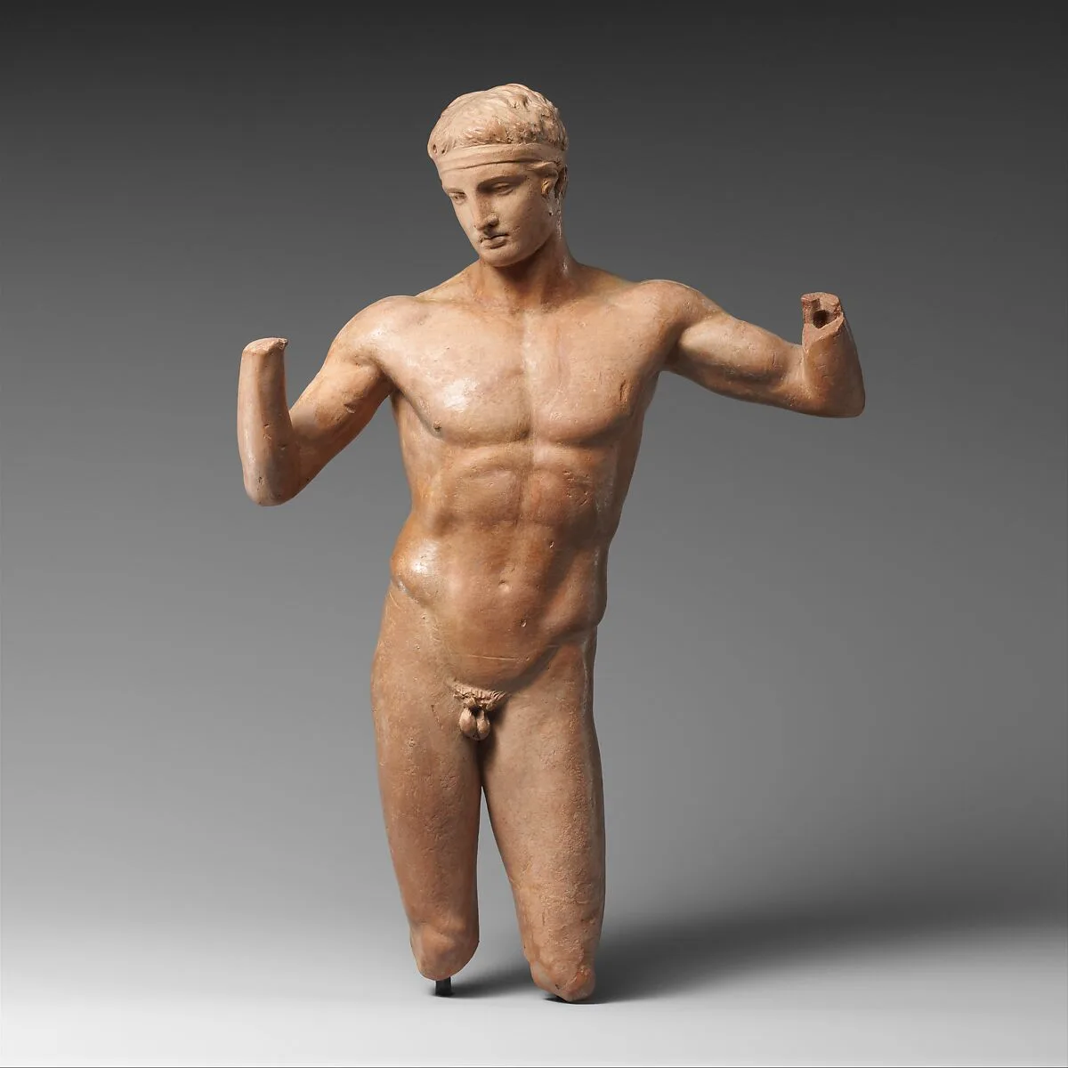 Terracotta statuette of the Diadoumenos (youth tying a fillet around his head) — Unknown