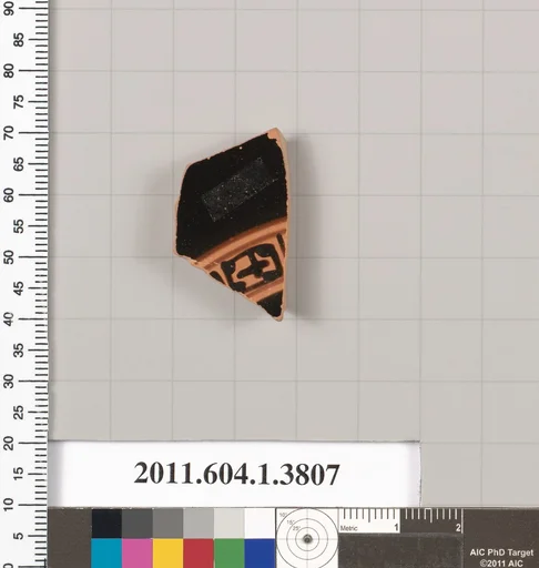 Terracotta fragment of a kylix (drinking cup)