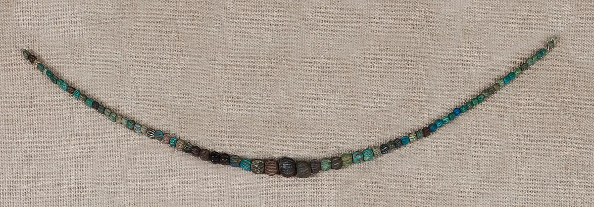 Necklace of striated beads — Unknown