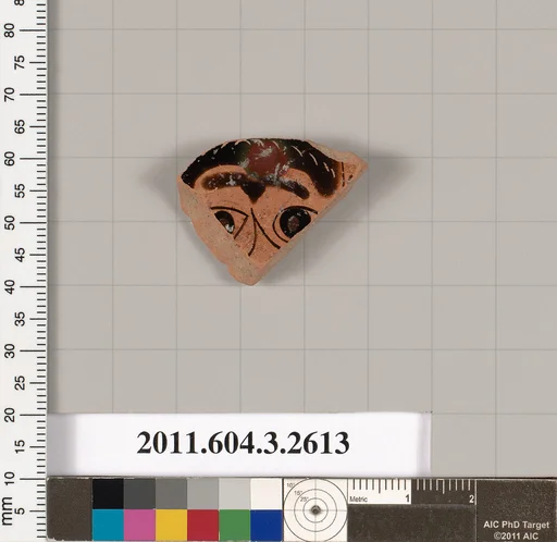 Terracotta fragment of a kylix (drinking cup)