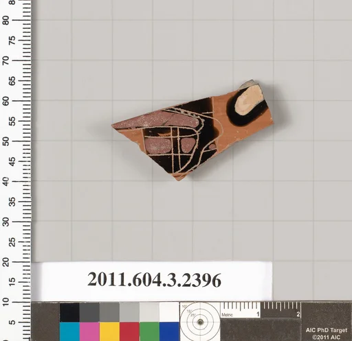 Terracotta fragment of a kylix: eye-cup (drinking cup)