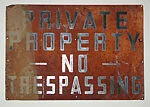 [Rusted Metal Sign: "Private Property, No Trespassing"]