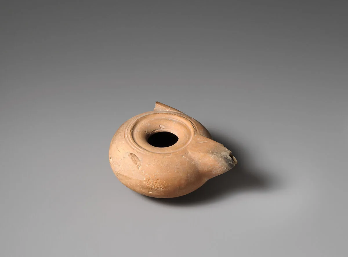 Terracotta oil lamp — Unknown