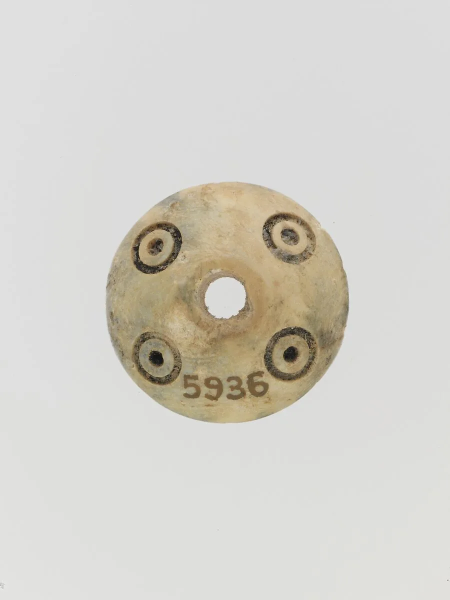 Bone spindle whorl — Unknown