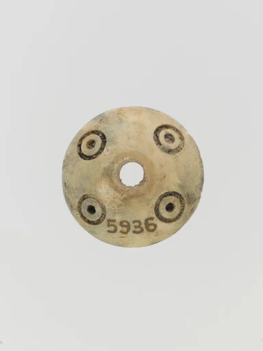 Bone spindle whorl