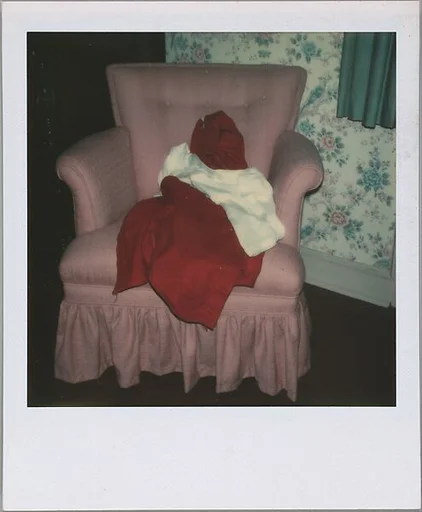 [Clothes Draped on Armchair]