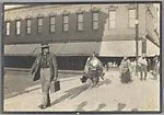 [Pedestrians Crossing Street]
