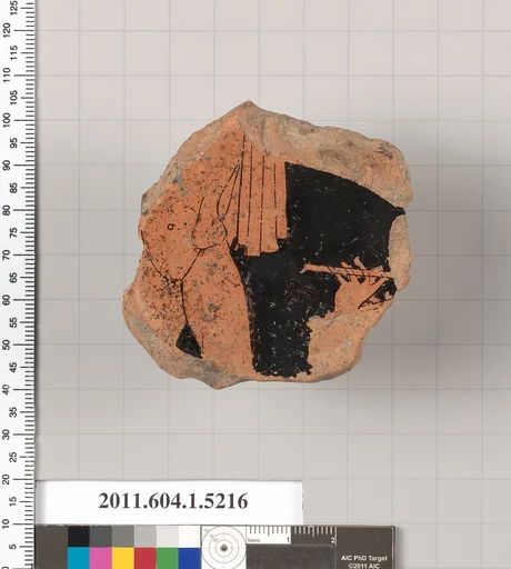 Terracotta fragment of a kylix (drinking cup)