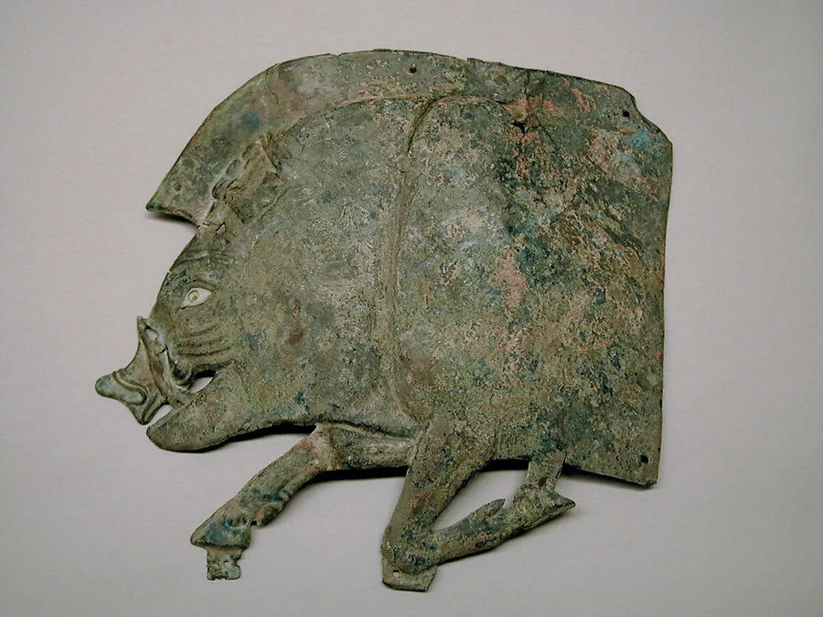 Bronze plaque in the shape of a boar — Unknown