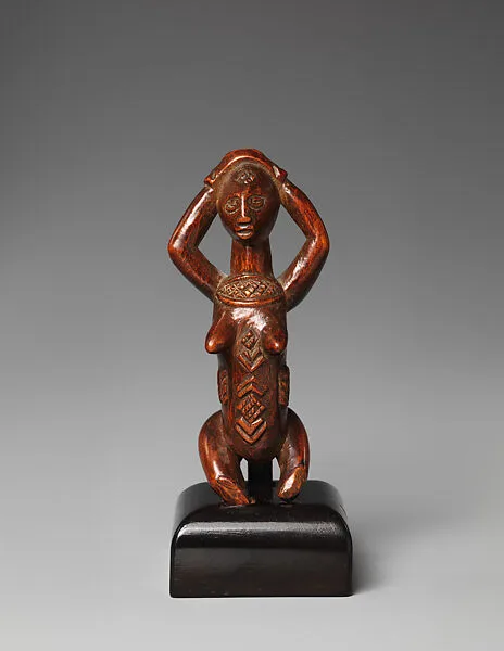 Kneeling Female Figure — Unknown