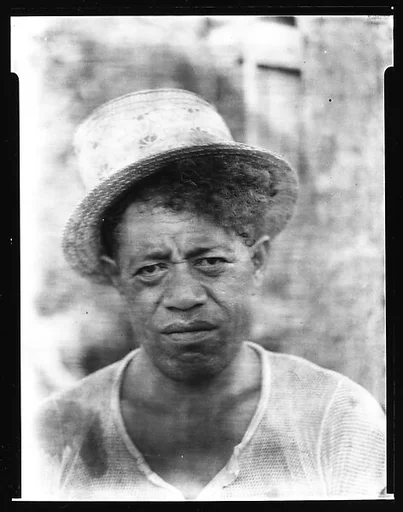 [South Seas: Man in Straw Hat]