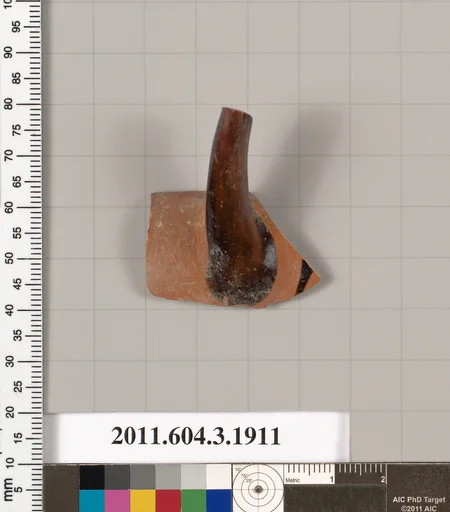 Terracotta fragment of a kylix (drinking cup) or a skyphos (deep drinking cup)?