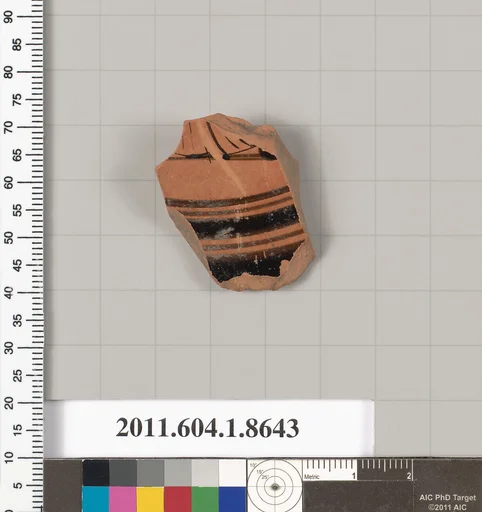 Terracotta fragment of a stemless kylix (drinking cup)