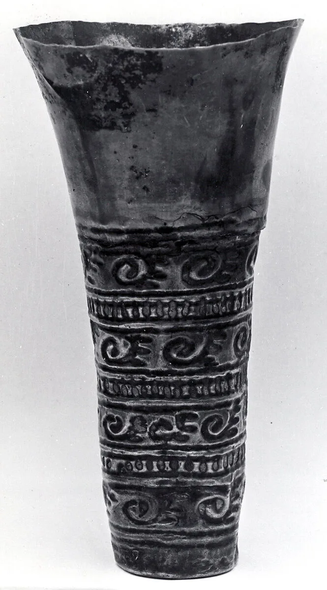 Beaker with scroll ornamentation — Unknown