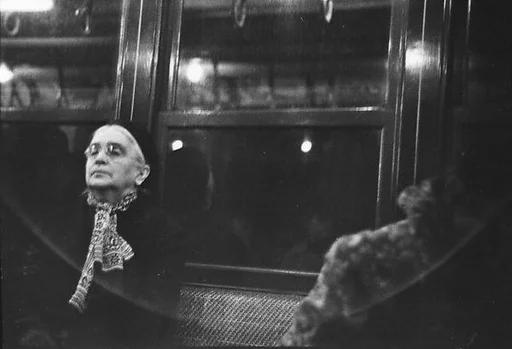[Three 35mm Film Frames: Subway Passengers, New York City: Sleeping Elderly Woman, Young Woman and Two Men, Two Women]