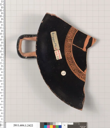 Terracotta fragment of a kylix (drinking cup)