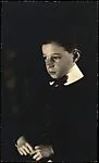 [Walker Evans, Facing Right with Joined Hands]
