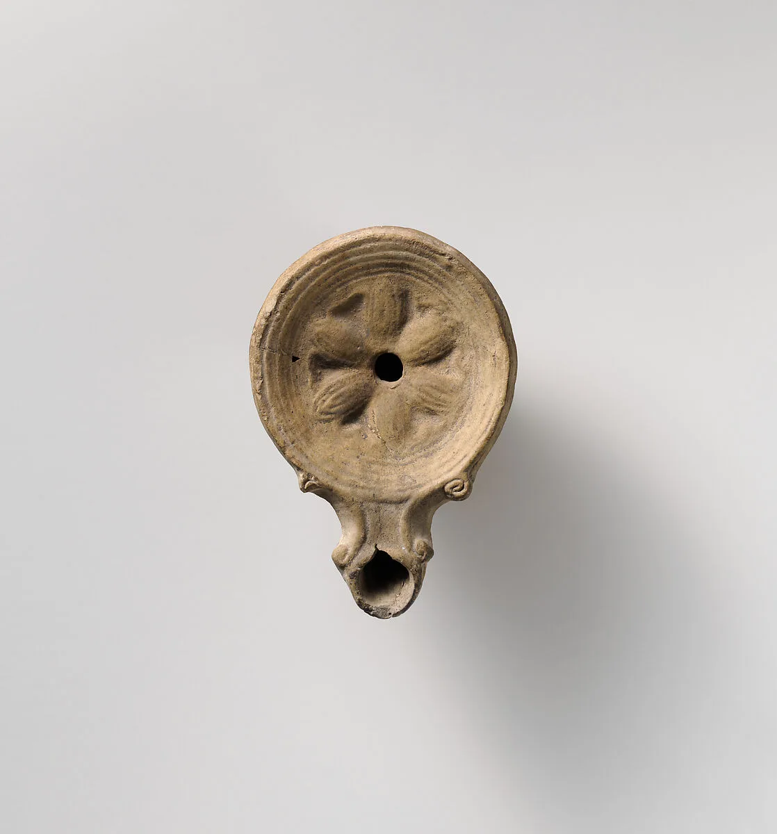Terracotta oil lamp — Unknown