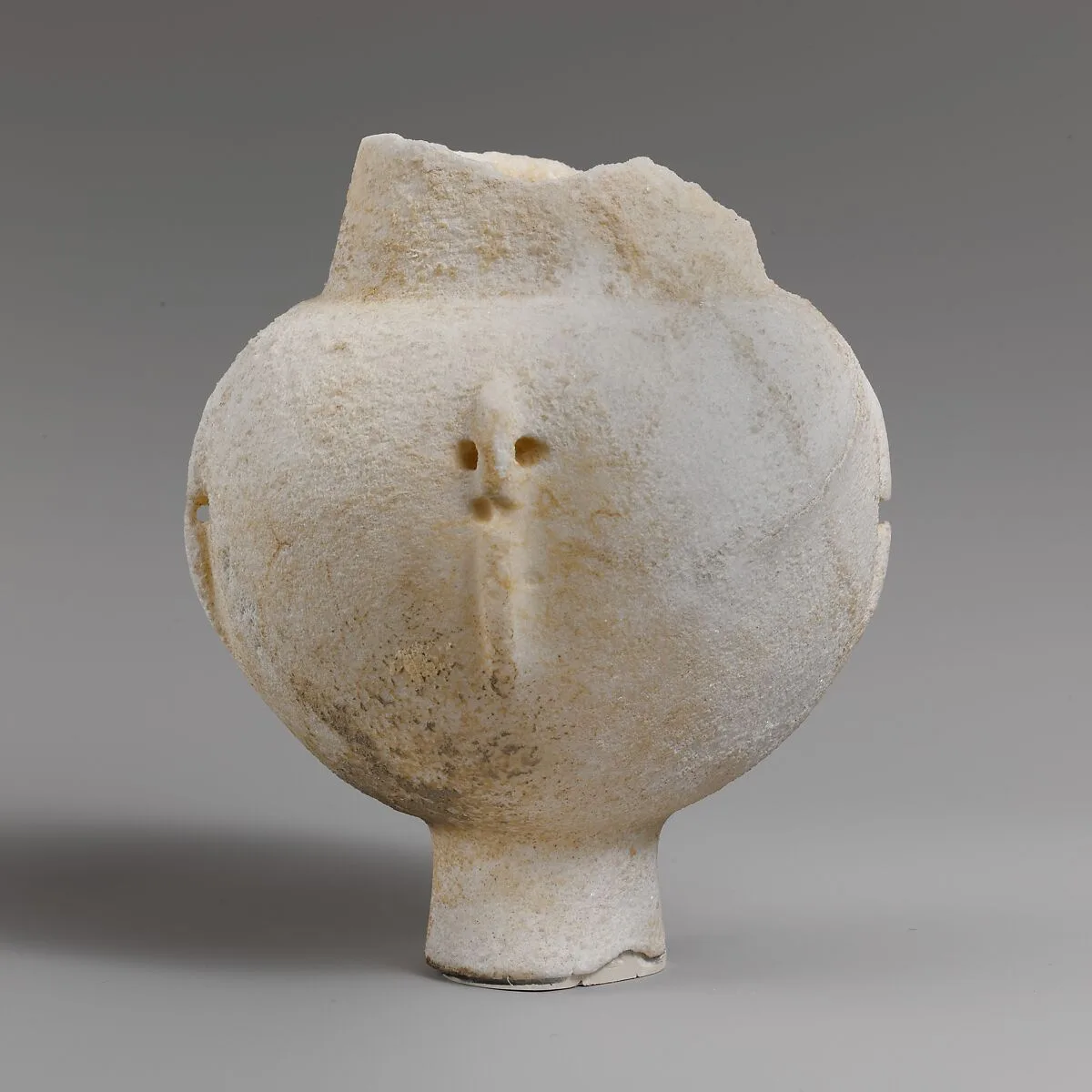 Marble vase with high foot and four lug handles — Unknown