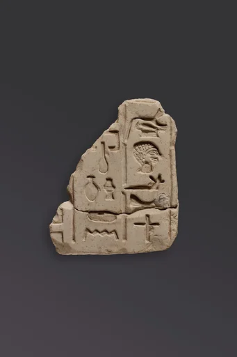 Relief fragments, inscription