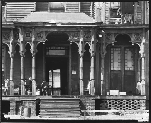 [Boarding House with Two Men Seated on Porch, Birmingham, Alabama]