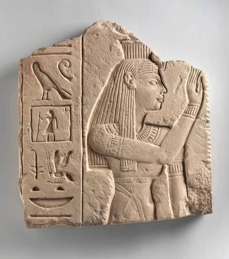 Relief of a goddess offering a palm rib