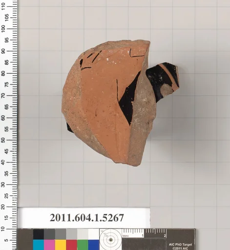 Terracotta fragment of a kylix (drinking cup)