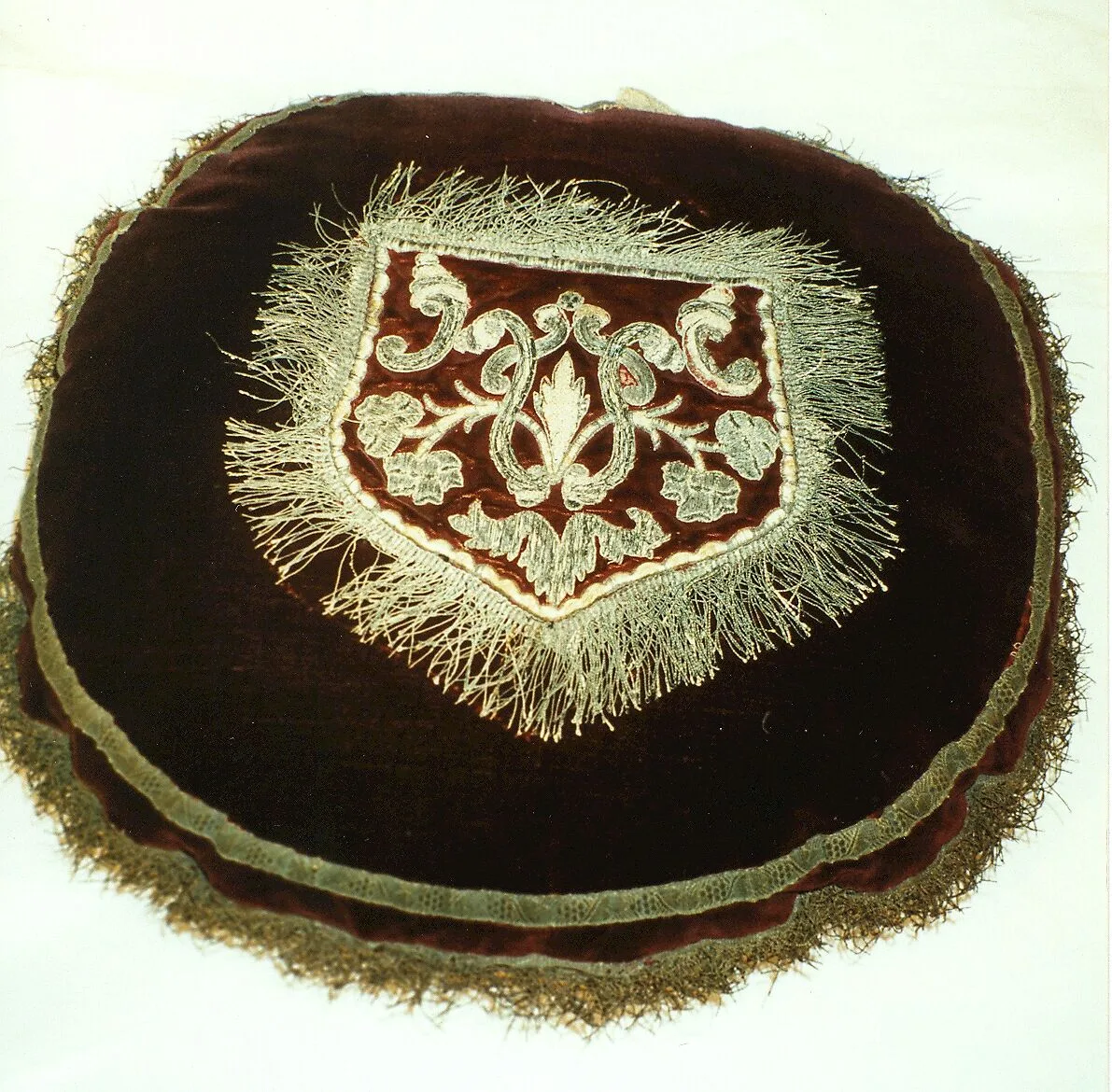 Pocket (sewn onto center of round cushion) — Unknown