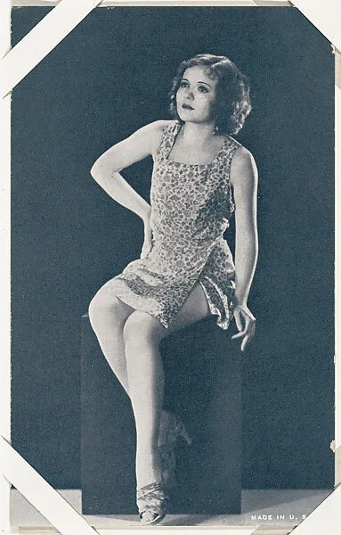 Actress seated with hand on hip (W423) — Unknown