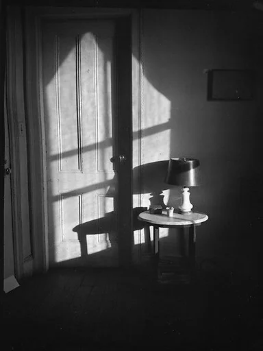 [Interior View of Walker Evans's Apartment Showing Lamp on Table, 441 East 92nd Street, New York City]