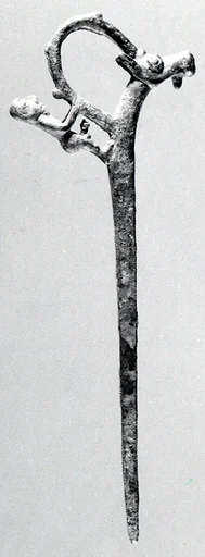 Pin with a nude male and an ibex